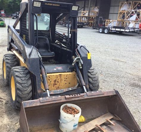 565 new holland skid steer|new holland 565 specs.